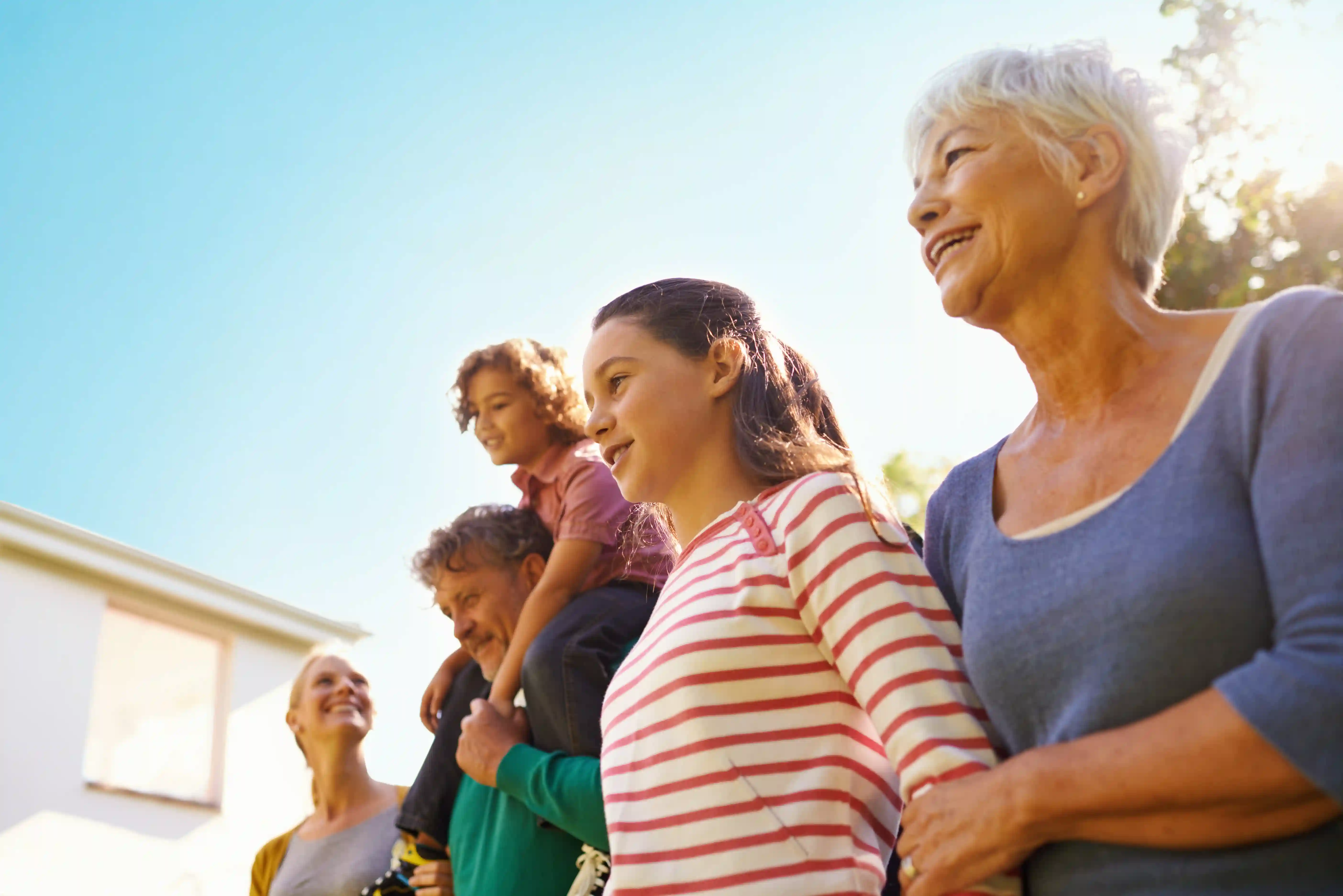Family standing together — the people behind every successful group home
